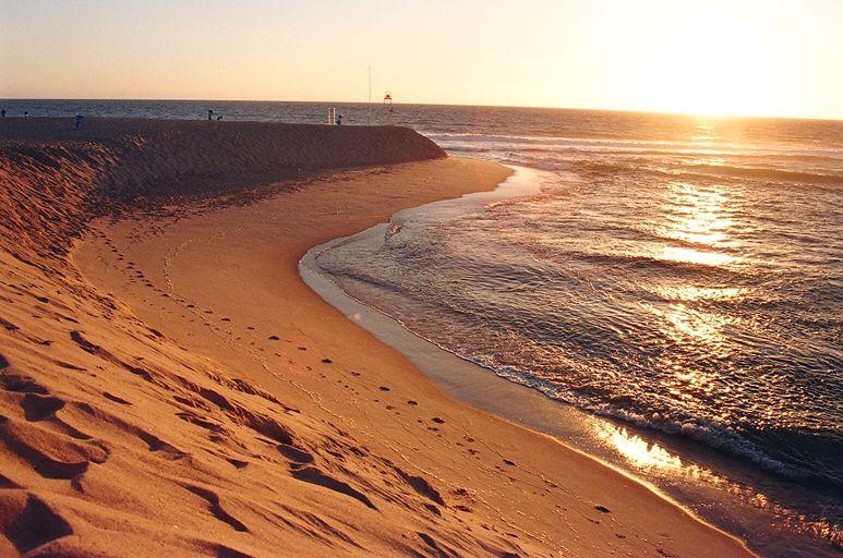 Indian investors comparing global golden visa options and focusing on Portugal on a world map